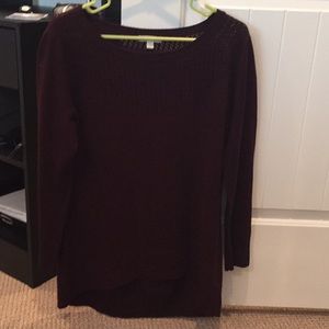 Burgundy tunic length sweater.